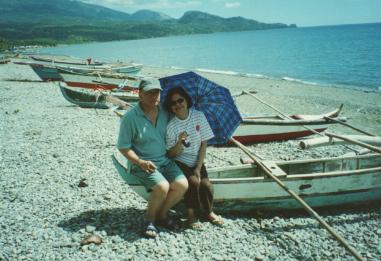 My wife and I overlooking Marinduque, Philippines ocean